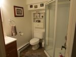 Downstairs Bathroom with a walk in shower